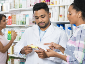 Pharmacy assisting customer