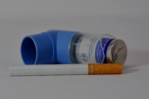 asthma inhaler and cigarette